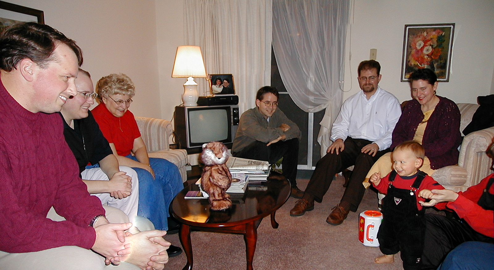 Paul, Marc, Mom, Robert, Steve and Jackie admiring baby Miles at Aunt Dory's apartment